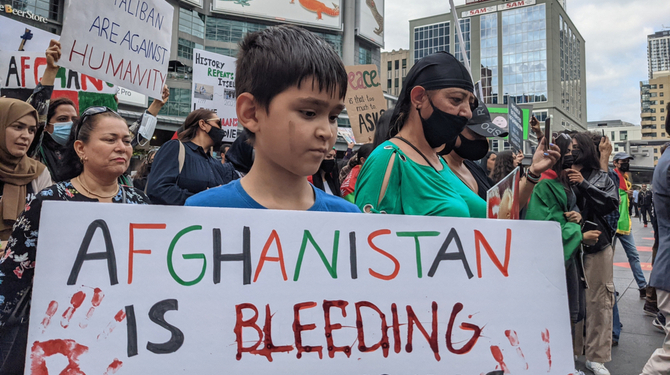 Toronto, Canada. August 15, 2021 Afghanistan protesters at Dundas Square in Toronto