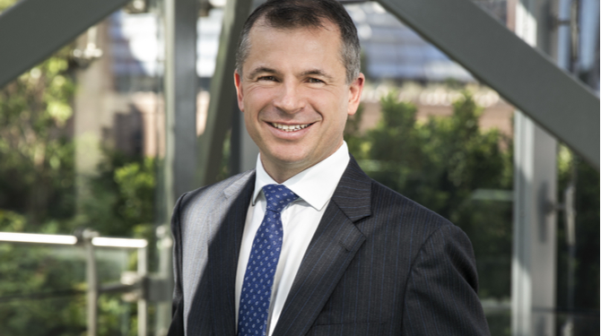 Photograph of Ashurst managing partner Paul Jenkins outside the firm's offices