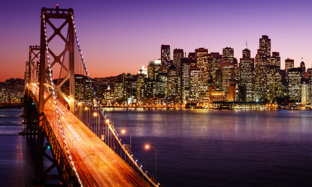 A photo of the Bay Bridge in San Francisco at sunset