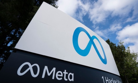 Menlo Park, CA, USA - Apr 30, 2022: Closeup of the Meta sign at the entrance to the Meta Platforms headquarters in Menlo Park, California. Meta Platforms, Inc. is an American tech conglomerate.