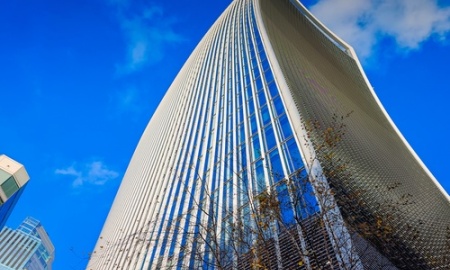 20 Fenchurch Street. Close up photo of a Walkie Talkie called skyscraper with a Sky garden terrace on a sunny day