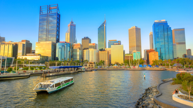 Elizabeth Quay Marina at sunset with skyscrapers of Central Business District on background in Perth, Western Australia.