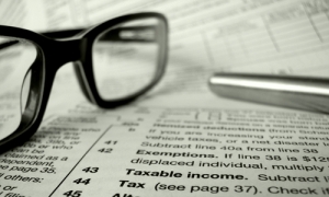 UK partners seek bank loans to meet tax rules